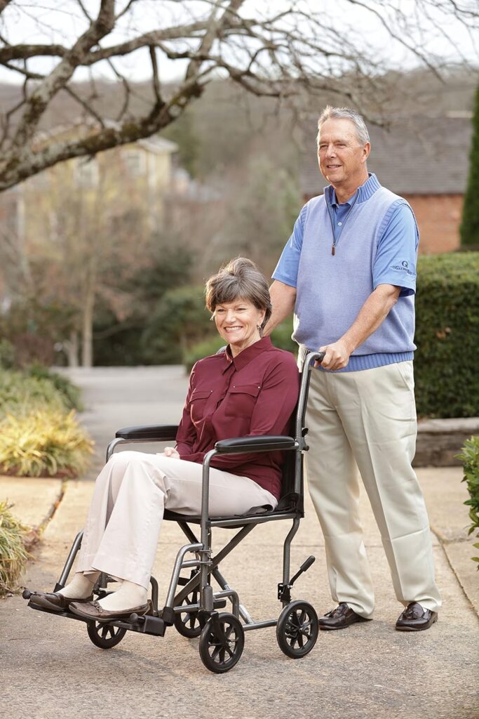 Drive Medical TR37E-SV Lightweight Folding Transport Wheelchair with Swing-Away Footrest, Silver